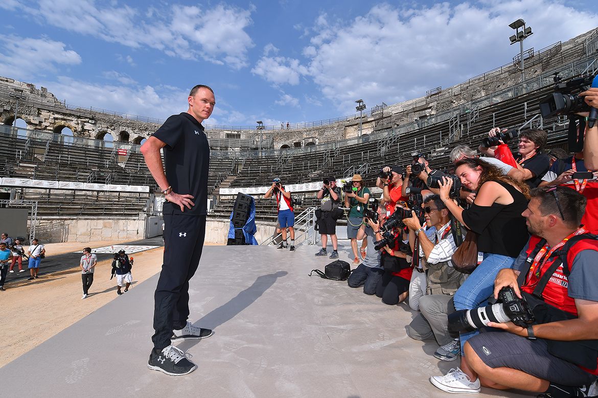 Chris Froome poses for photos in the Nimes amphitheatre