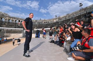 Chris Froome poses for photos in the Nimes amphitheatre