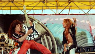 Eddie Van Halen (left) and David Lee Roth of Van Halen perform live at The Oakland Coliseum in 1977 in Oakland, California