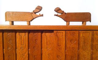 modern hippos happily wallowing atop a Hans Wegner cabinet
