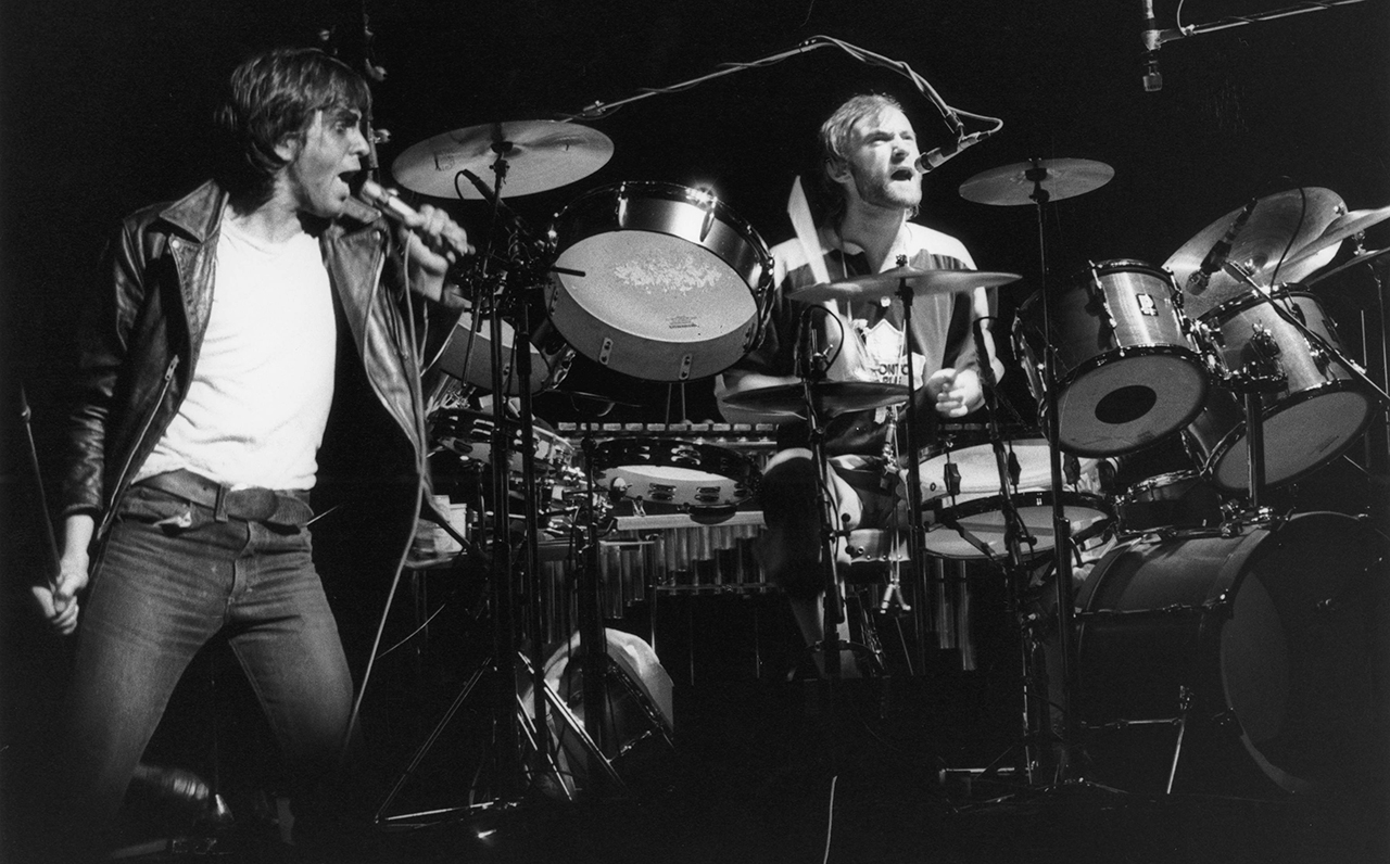GERMANY - JANUARY 01: Photo of GENESIS and Peter GABRIEL and Phil COLLINS; Peter Gabriel &amp;amp; Phil Collins (playing drums and singing) performing live onstage, The Lamb Lies Down On Broadway Tour (Photo by Ellen Poppinga - K &amp;amp; K/Redferns)
