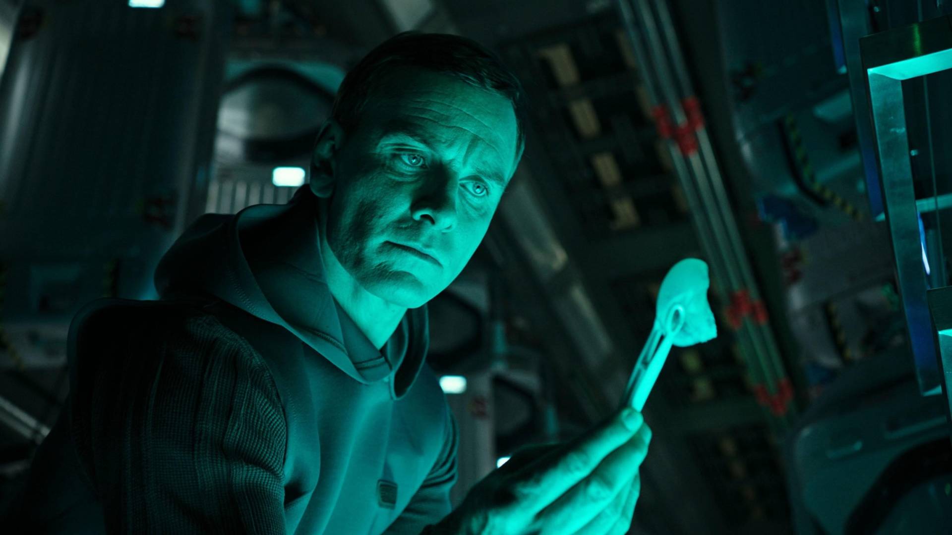 Walter/David (Michael Fassbender) looks at a sample in Alien: Covenant 