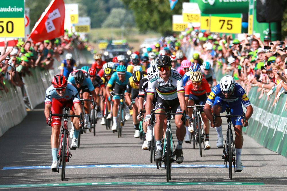 Peter Sagan (Bora-Hansgrohe) beats Fernando Gaviria and Nathan Haas in the first Tour de Suisse sprint