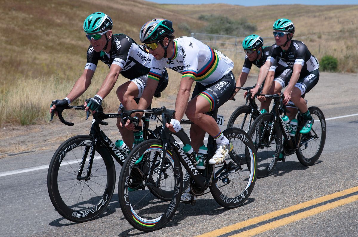 Peter Sagan enjoying a chinwag with Maciej Bodnar (Bora-Hansgrohe)