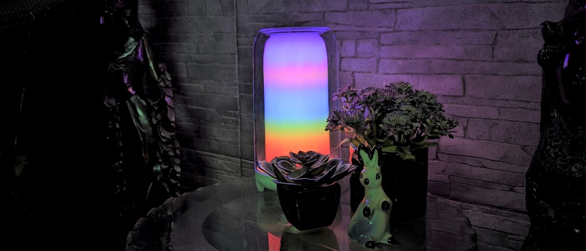 ECOLOR Aurora Smart Table Lamp on a glass table