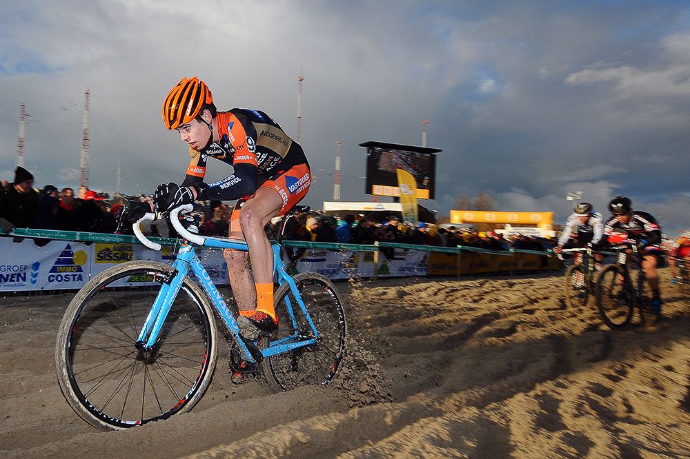 Wout van Aert in the sand.
