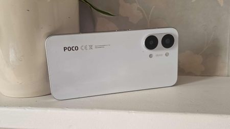 The Poco X8 Pro Max placed horizontally on a ledge.