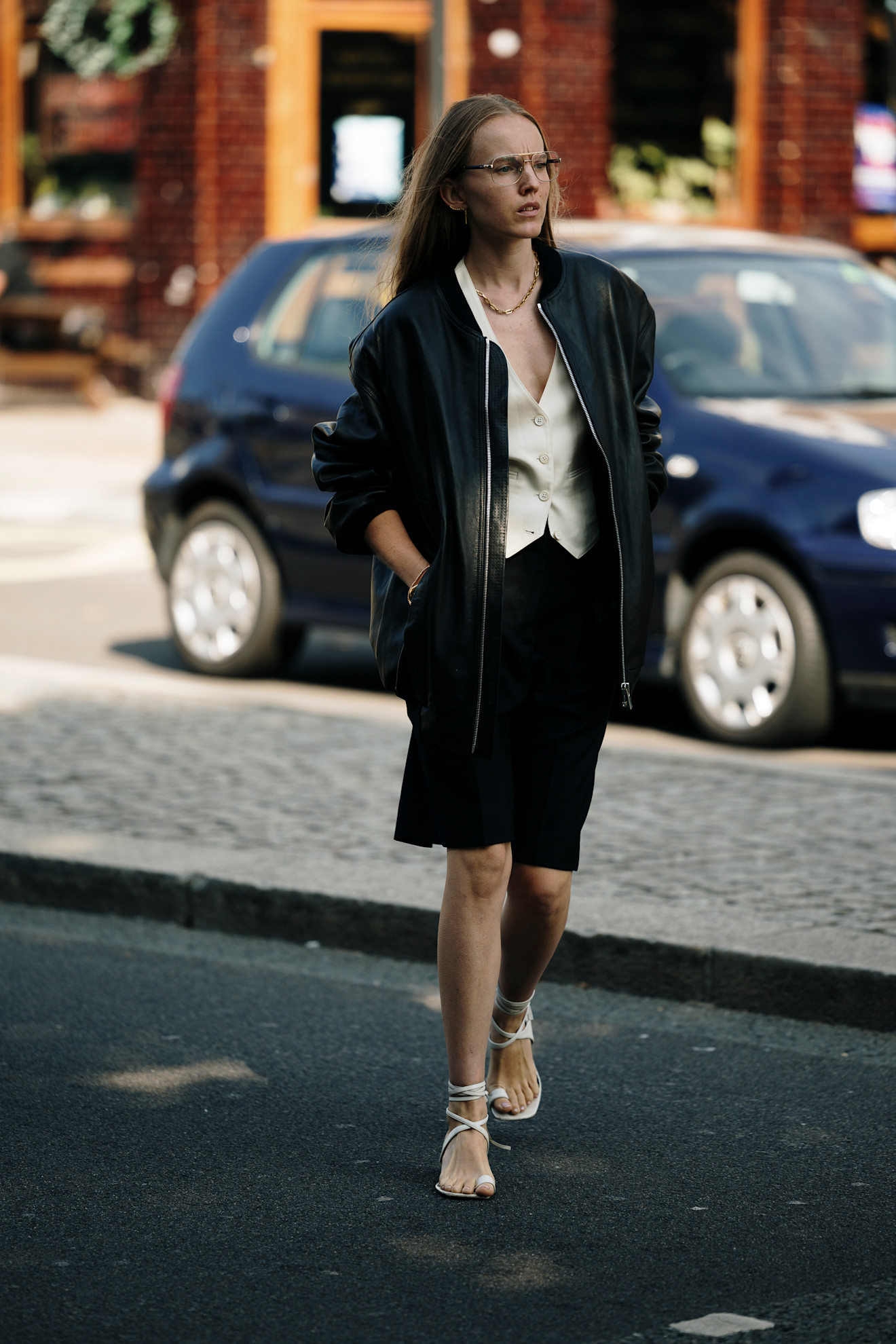 A woman wearing toe ring sandals in London.