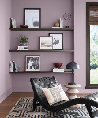 purple room with modern furniture and shelving