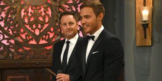 The Bachelor 2020 Chris Harrison looks at camera next to Bachelor Peter Weber