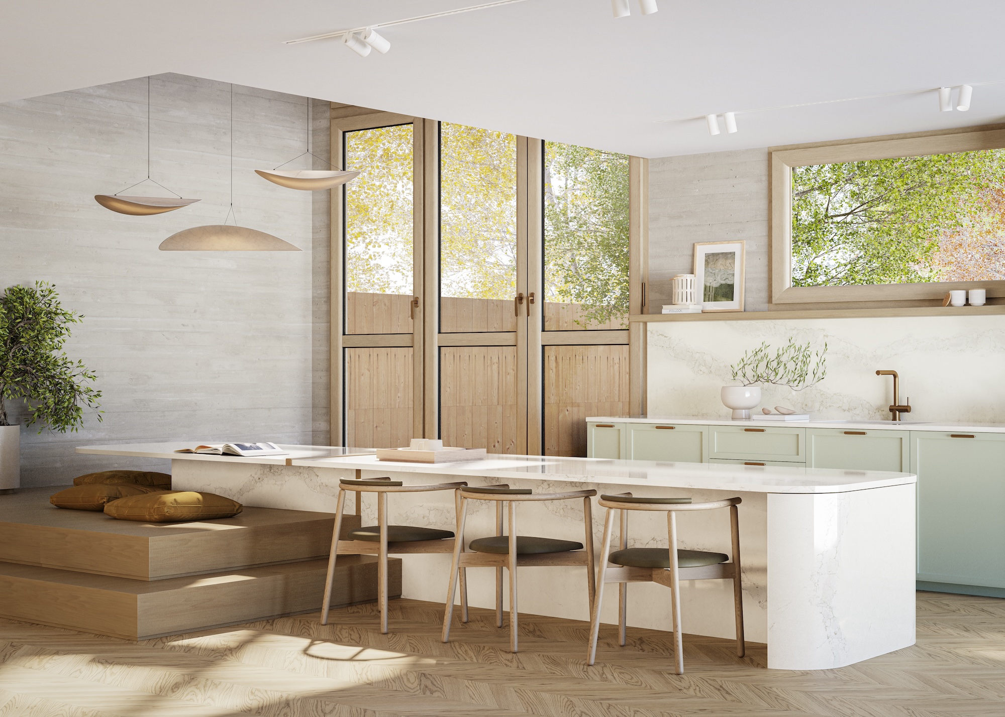 A large island sits in the middle of a kitchen with chairs beside it as well as cabinets in a pastel green opposite the island/dining area. There are spotlights on the ceiling as well as pendant lights hanging in a certain area of the kitchen.