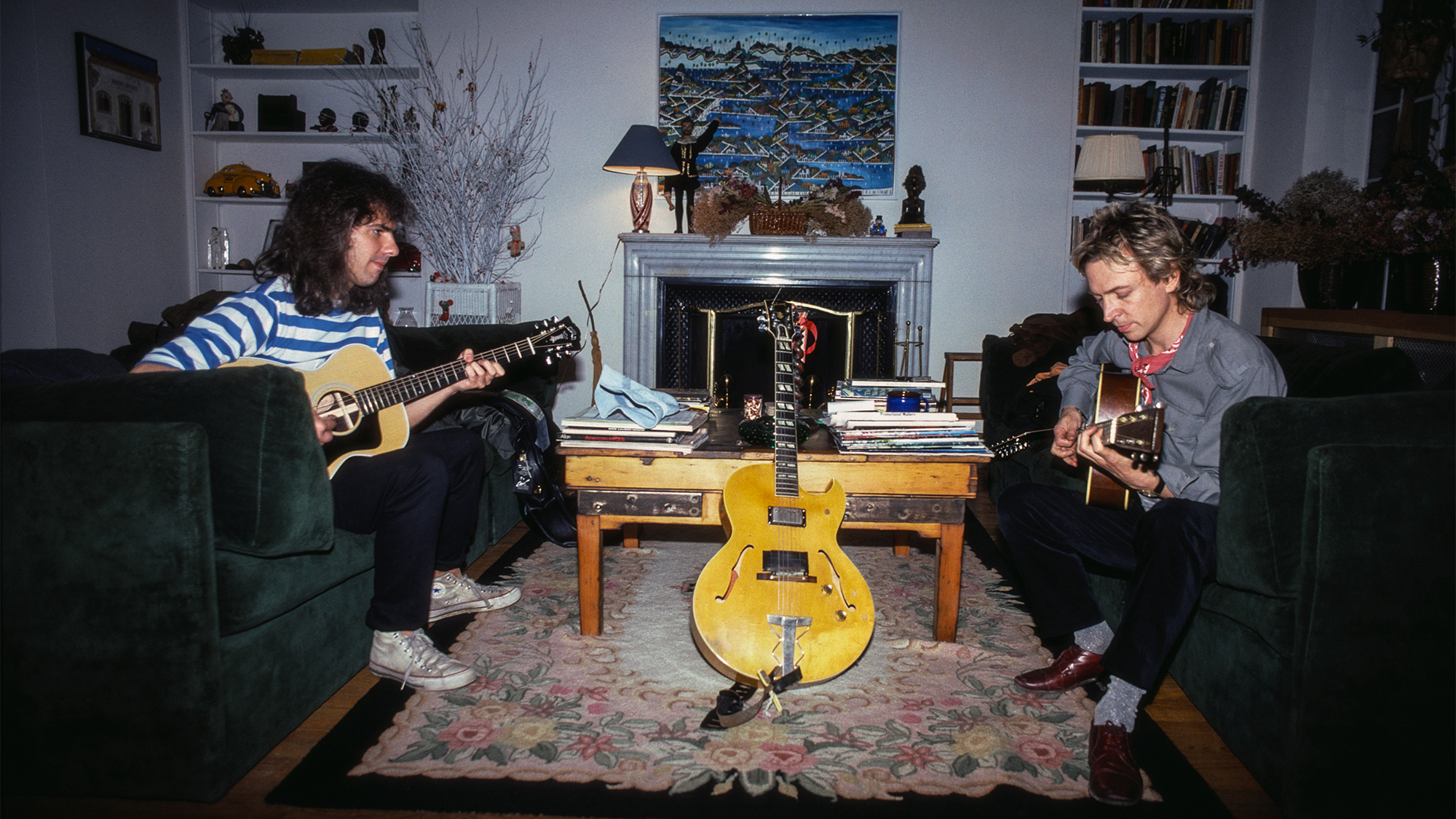 Jazz Guitarist Pat Metheny and Andy Summers of The Police Playing Guitars in Living Room, 1982. Metheny's well-worn and modified Gibson ES-175 is in the center.