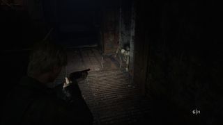 Leon exploring Toluca Prison in the Silent Hill 2 remake