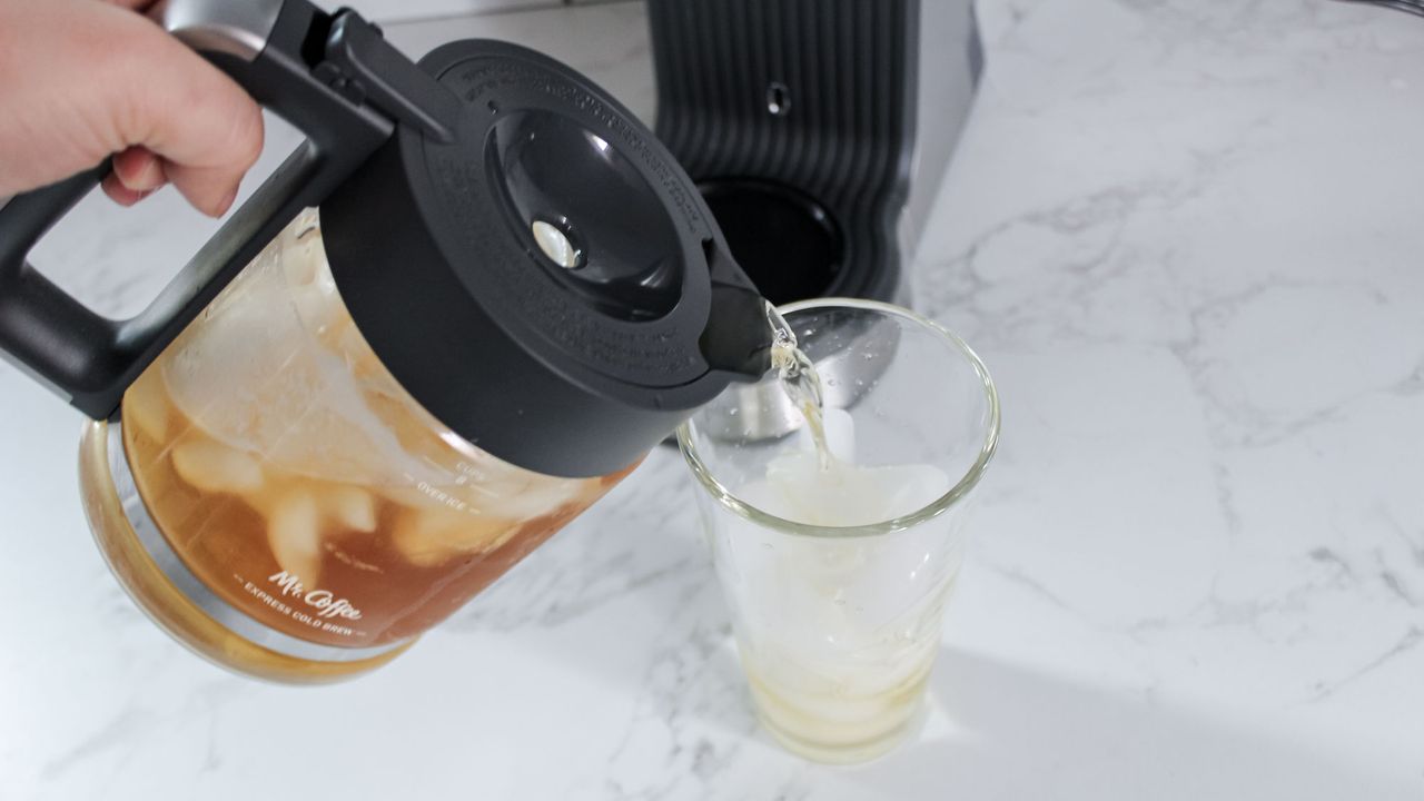Pouring from a carafe of iced tea