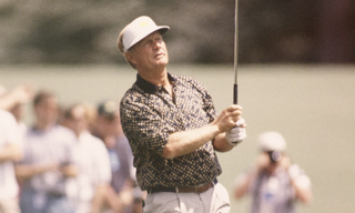 Jack Nicklaus plays an iron shot at the 1995 Masters