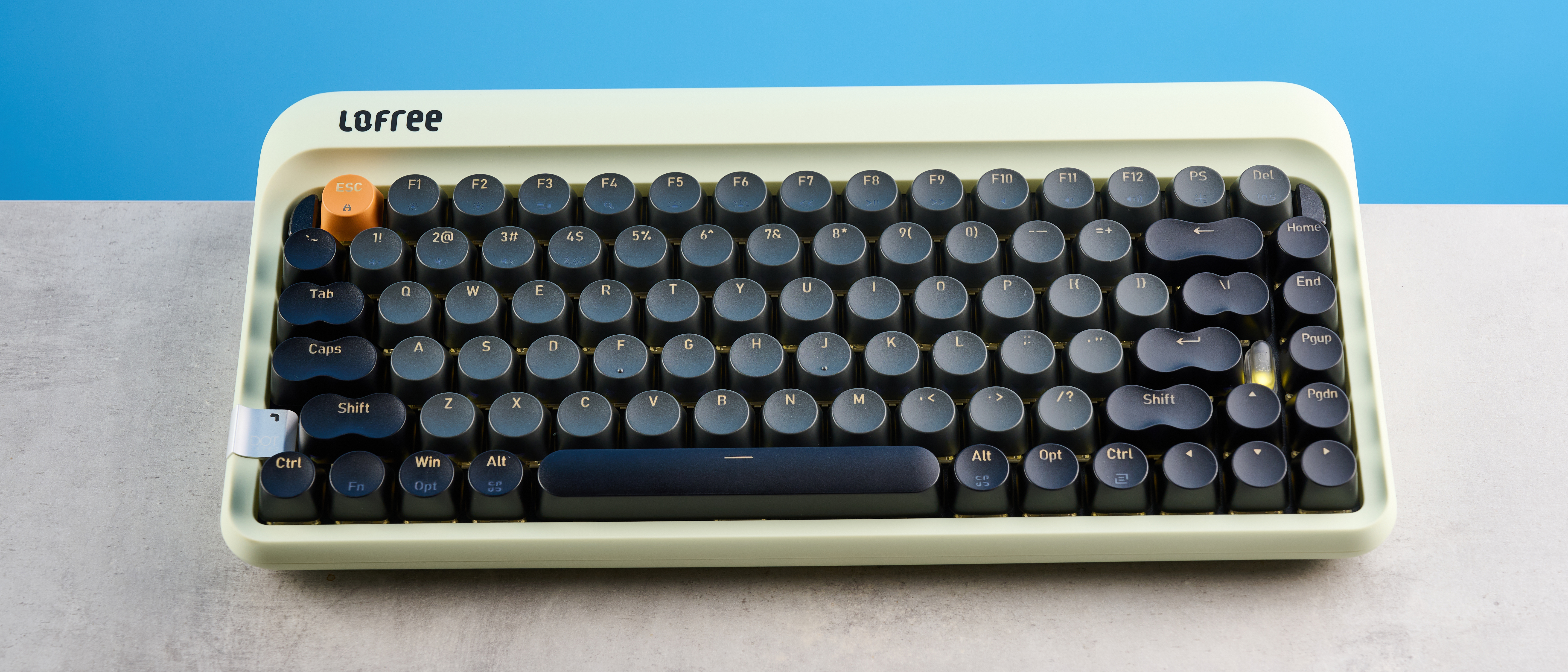 The Lofree DOT on a stone surface