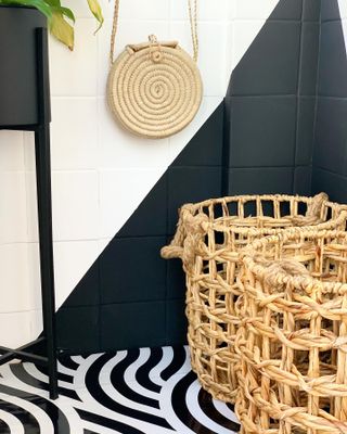 Basket set in black and white tiled tiny porch
