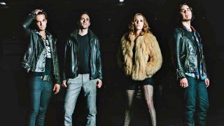 Halestorm posing for a photograph in 2015