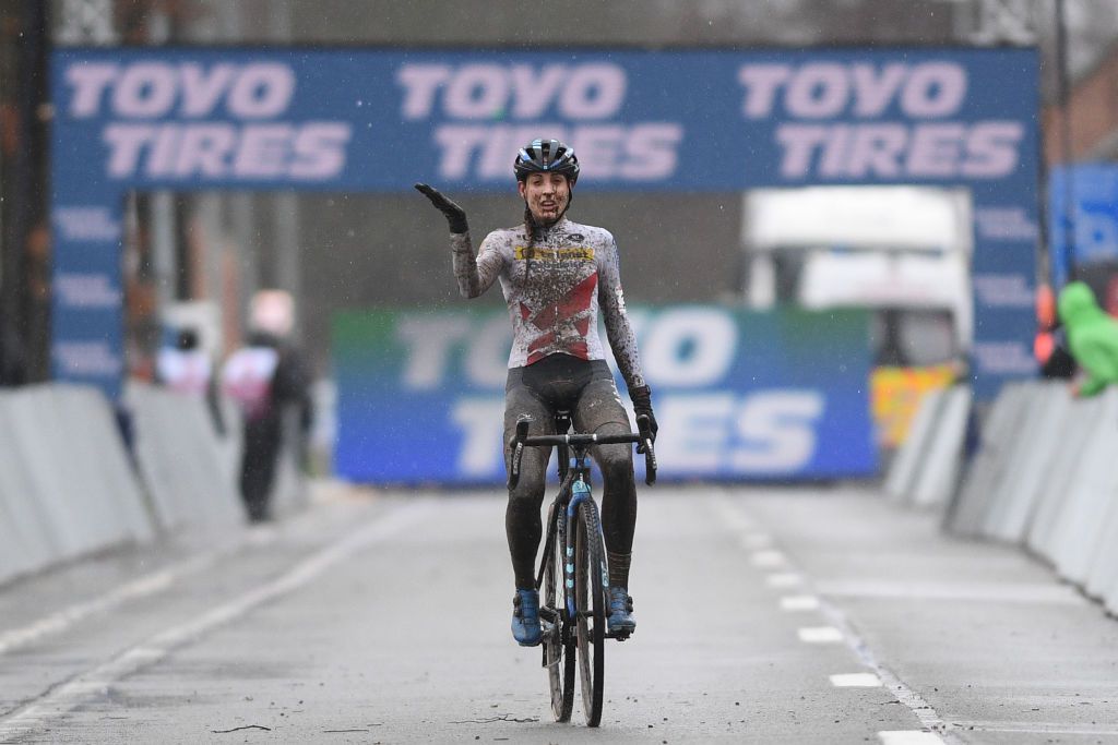 Dutch Lucinda Brand celebrates as she crosses the finish line to win the third stage of the UCI World Cup competition womens elite race of the World Cup cyclocross in Dendermonde on December 27 2020 Photo by DAVID STOCKMAN BELGA AFP Belgium OUT Photo by DAVID STOCKMANBELGAAFP via Getty Images