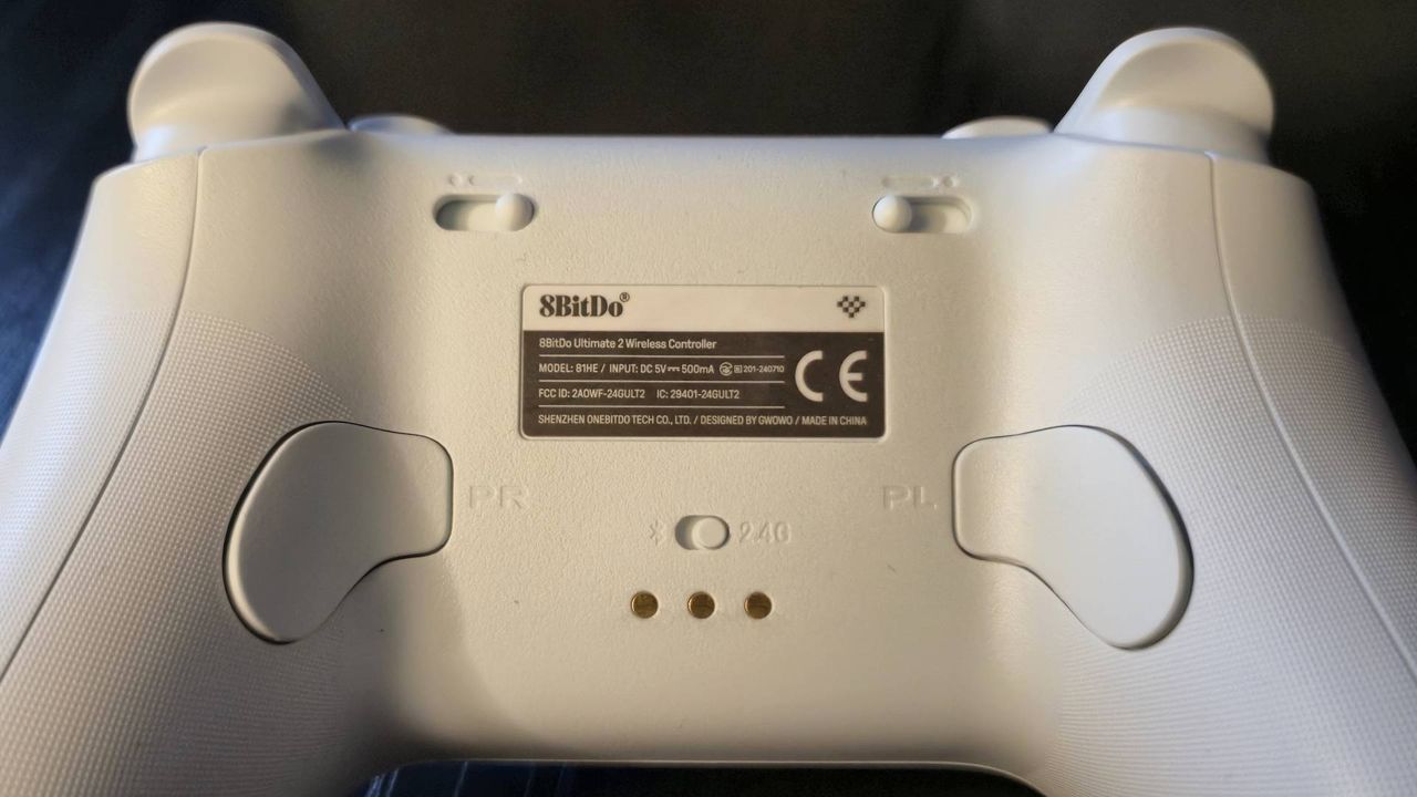 Photo showing the back of the 8BitDo Ultimate 2 controller and its extra programmable buttons.
