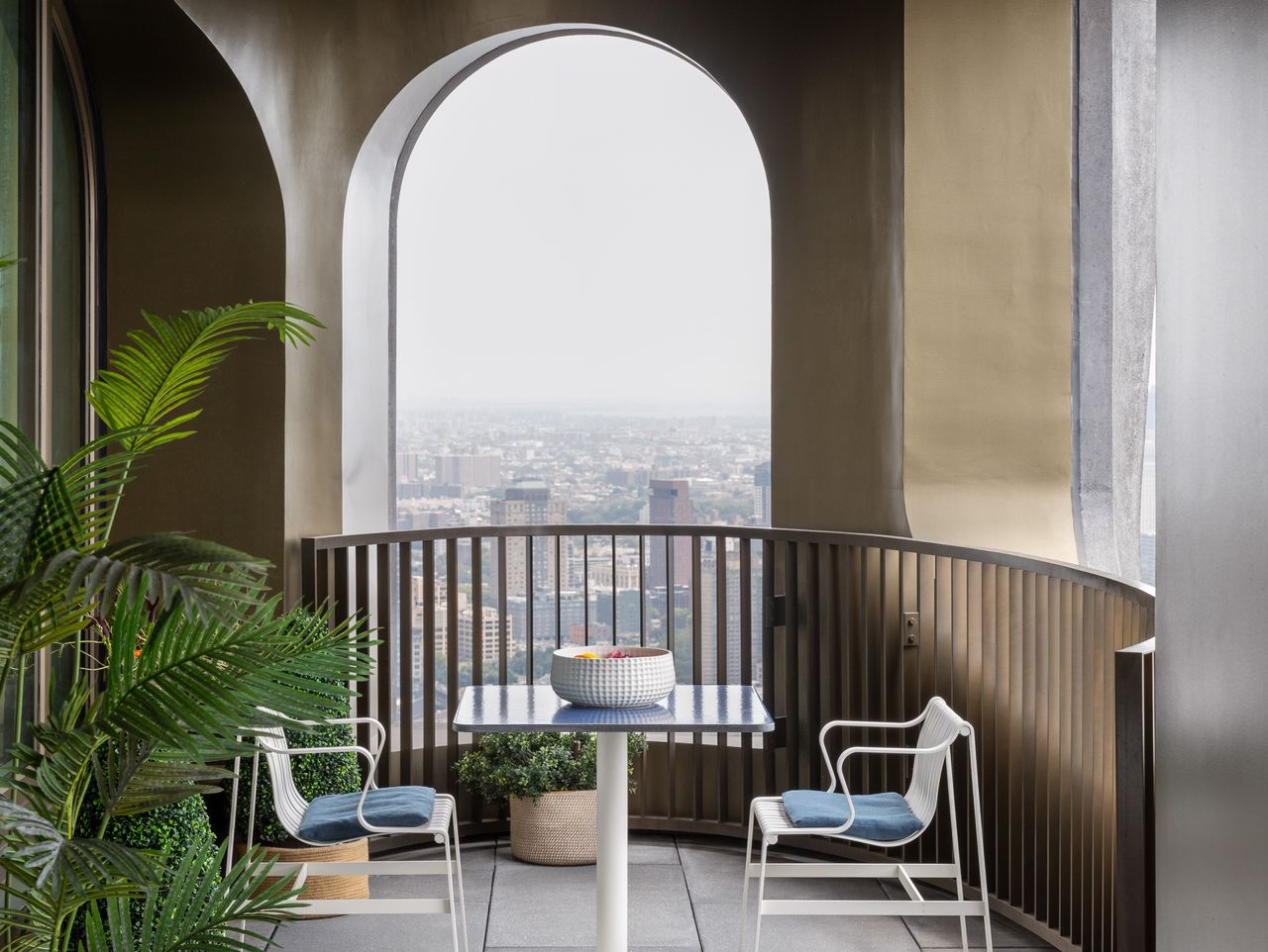 A small balcony with gloss paint on the walls