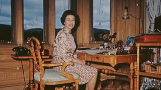 Queen Elizabeth II at the writing desk in her study in Balmoral Castle