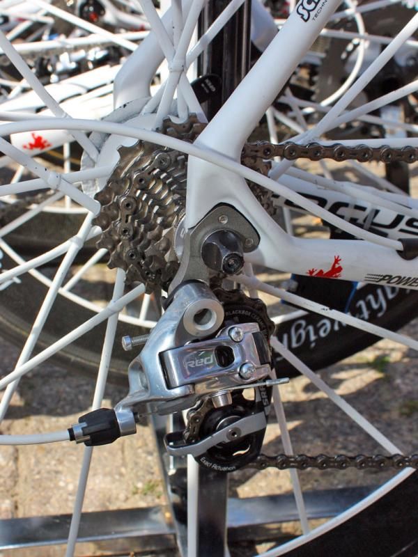 Chunky aluminum replaceable derailleur hangers are mounted to the rear ends of Team Milram's Focus Izalco Teams.