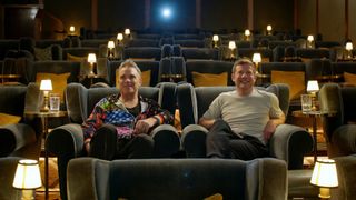 Robbie Williams and Dermot O'Leary sitting in a theatre for Robbie Williams: Reel Stories.