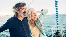 A couple enjoying a cruise on their yacht. 