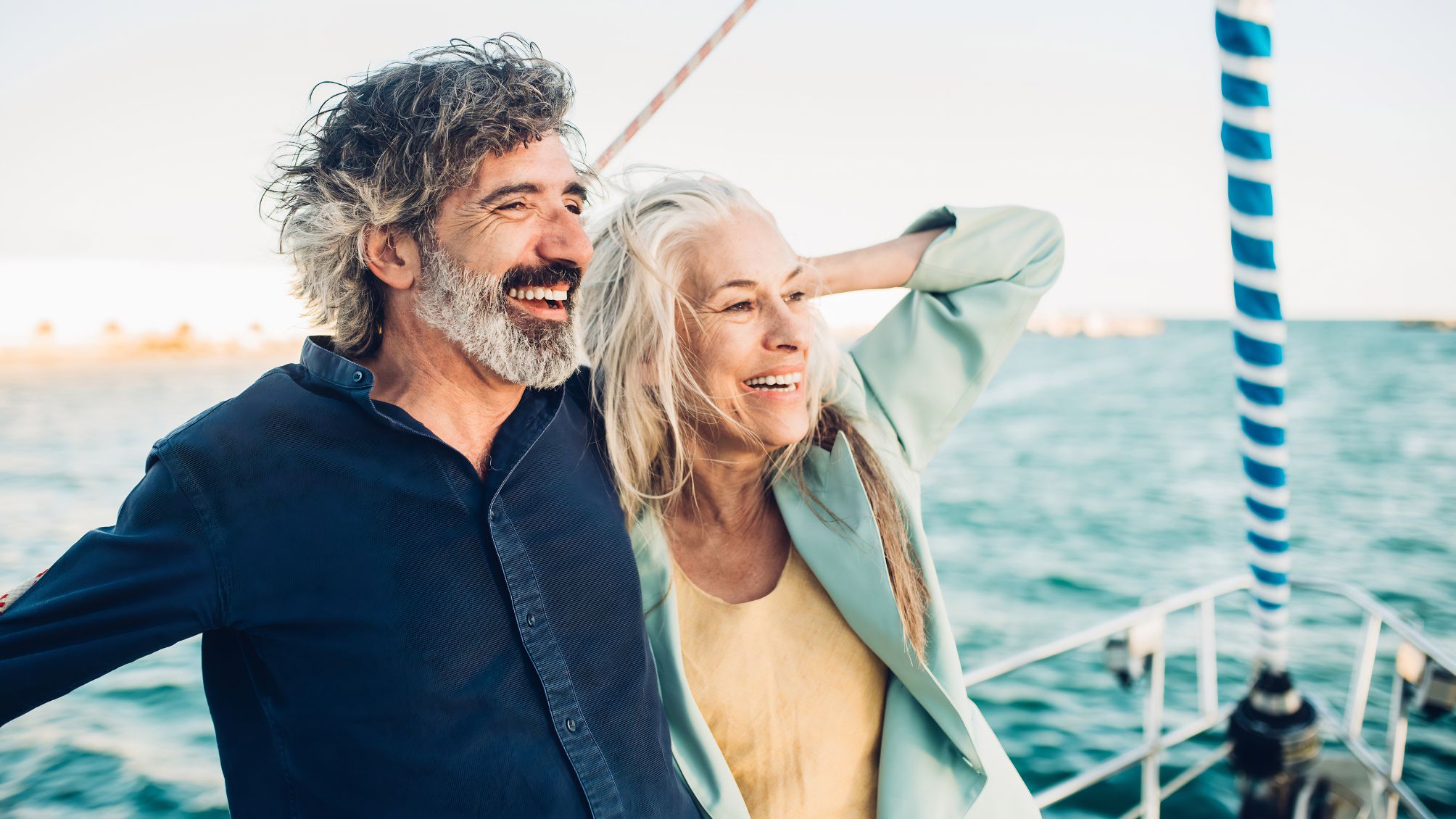 A couple enjoying a cruise on their yacht. 