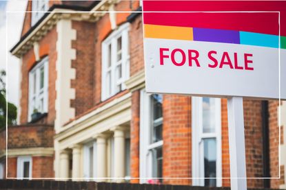 Close up of a for sale sign outside property