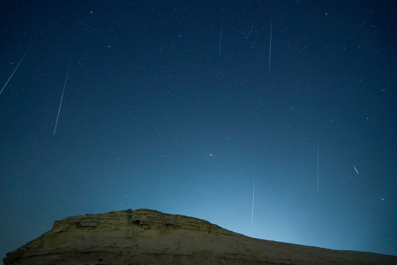 A meteor streaks across the night sky in Bazhou, Xinjiang Province, China, in the early morning of December 14, 2021.