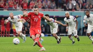 Gareth Bale of Wales scores the second goal from the penalty spot to make it 1-1 during the World Cup match between USA v Wales at the Ahmad Bin Ali Stadium on November 21, 2022 in Al Rayyan Qatar.