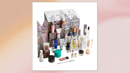 Image of Liberty&#039;s Beauty Advent Calendar 2024 with the lineup of products featured inside, on a pink watercolour background