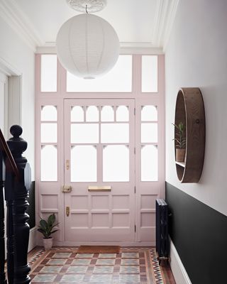 pink paint color Creme de la creme used to highlight the inside of a front door