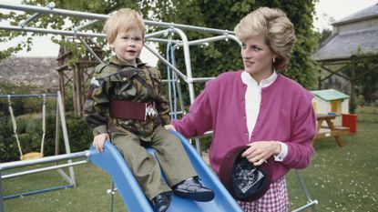 Prince Harry wearing the uniform of the Parachute Regiment of the British Army in the garden of Highgrove House in Gloucestershire, 18th July 1986. He is accompanied by his mother, Diana, Princess of Wales