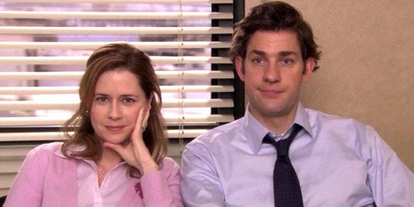 The Office Pam smiles to camera Jenna Fischer and Jim John Krasinski