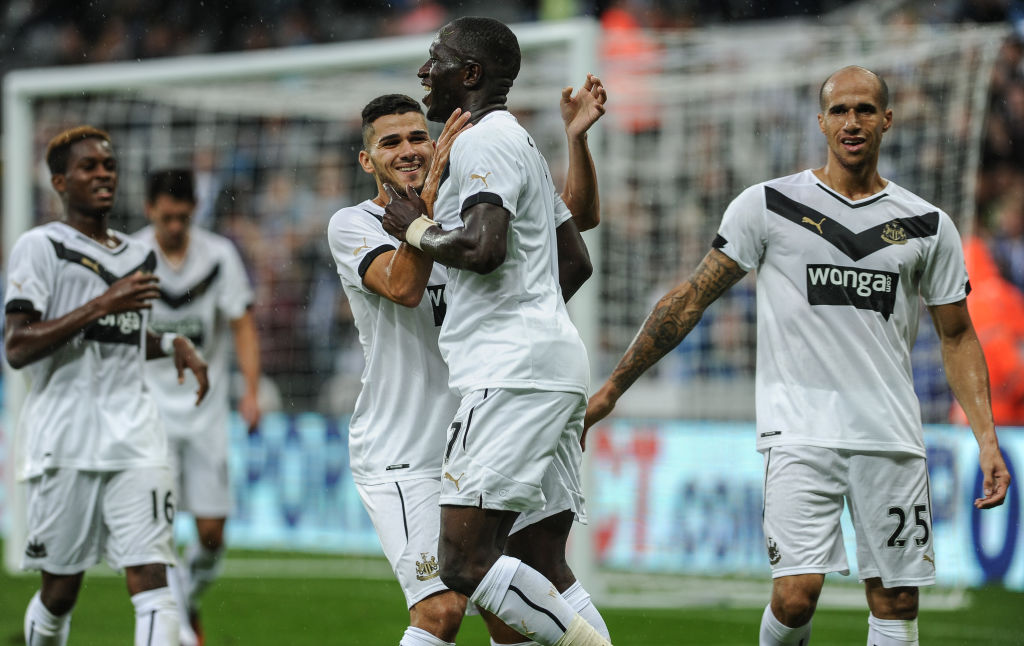Moussa Sissoko (C) of Newcastle celebrates with teammates Rolando Aarons (Far left), Mehdi Abeid (L) and Gabriel Obertan (R) after scoring the only goal during a Pre-Season Friendly between Newcastle United and Real Sociedad on August 10, 2014, in Newcastle upon Tyne, England.