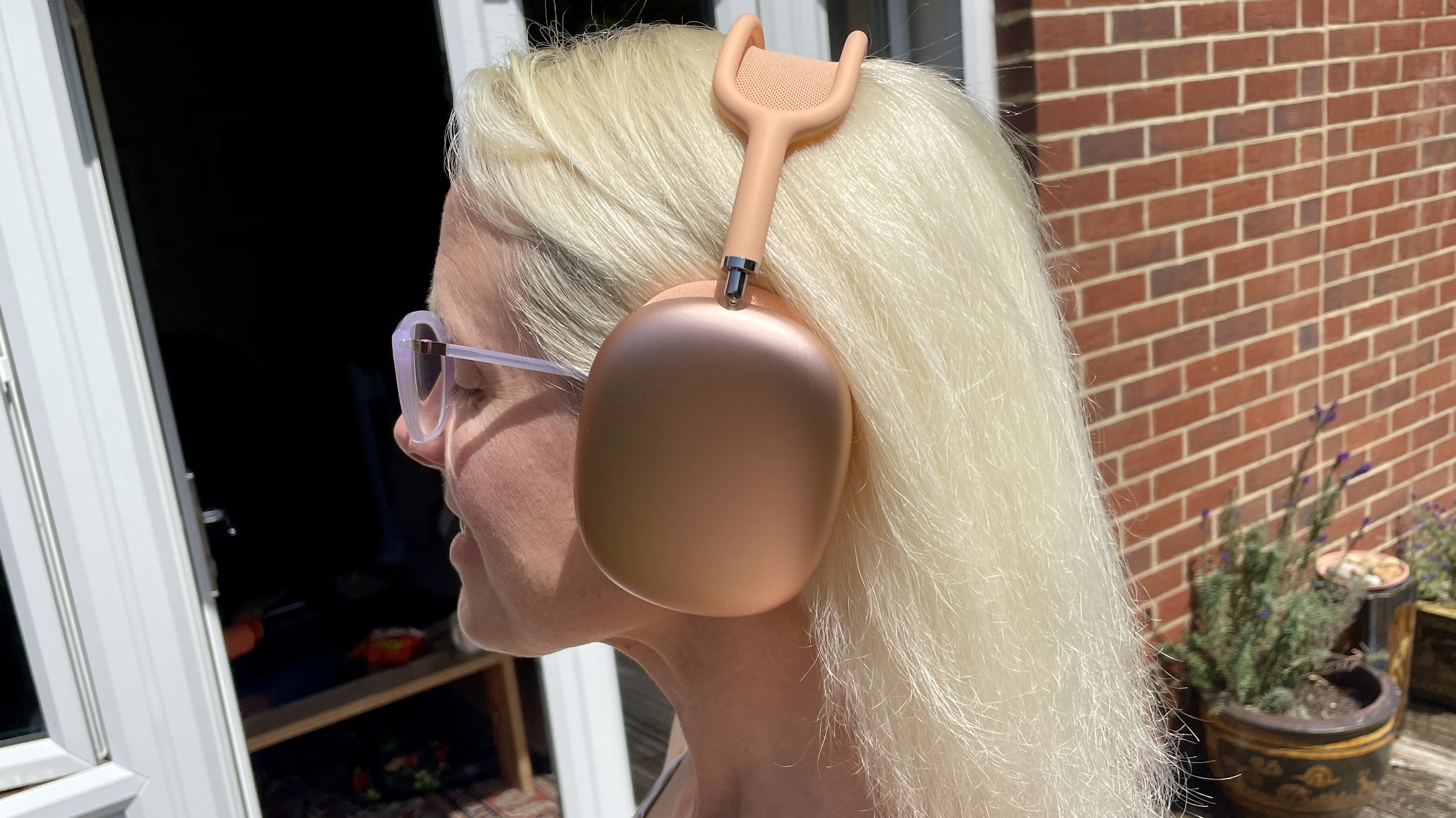 TechRadar's audio editor wearing AirPods Max 2 on a sunny day