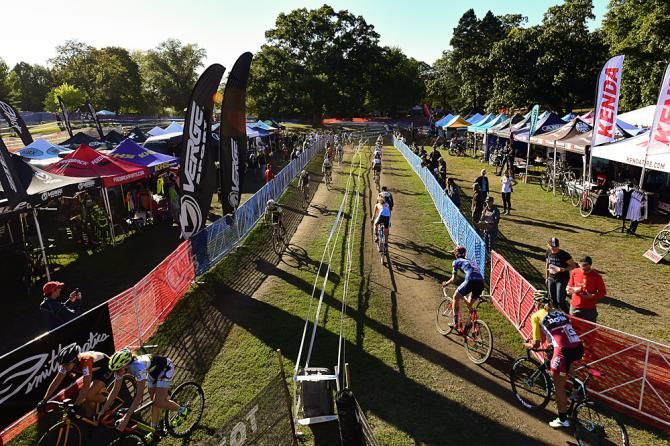The Elite Women on lap one making a U-turn around he announcers tower