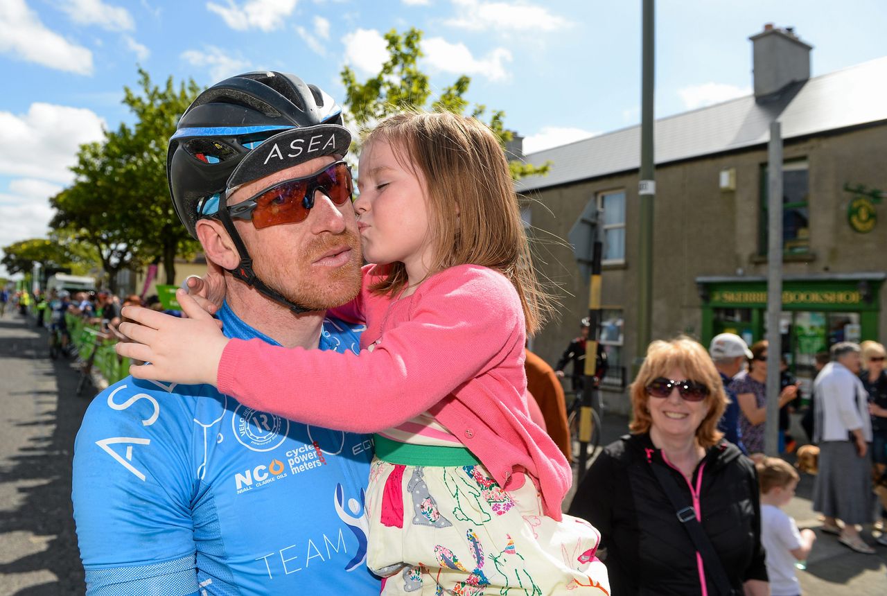 A kiss for daddy at the end of the race