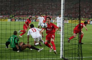 ISTANBUL, TURKEY - MAY 25: Liverpool midfielder Xabi Alonso of Spain (R) reacts after he scored the third goal during the European Champions League final between Liverpool and AC Milan on May 25, 2005 at the Ataturk Olympic Stadium in Istanbul, Turkey. (Photo by Mike Hewitt/Getty Images)