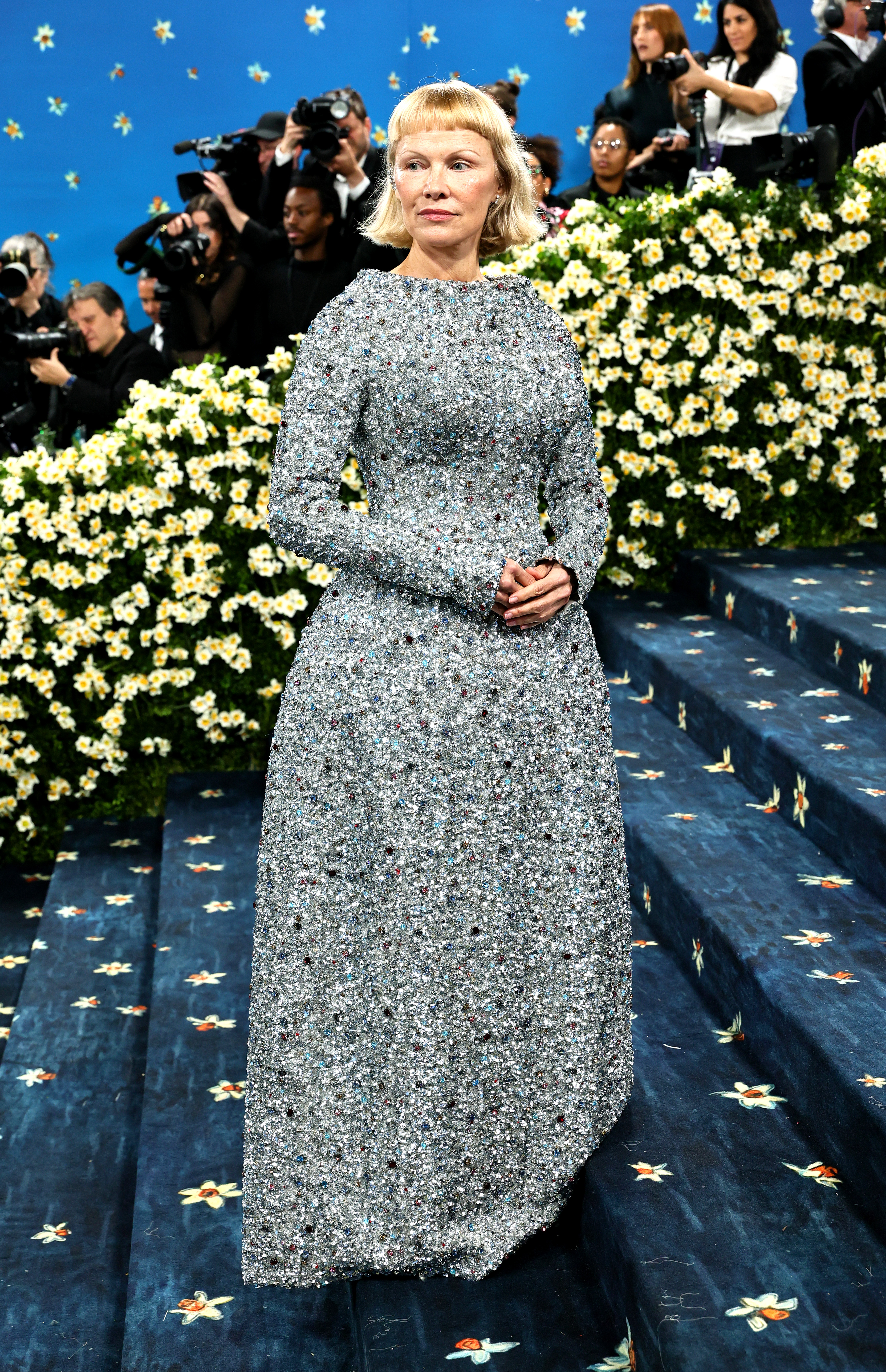 Pamela Anderson wears a slate grey dress to the 2025 Met Gala