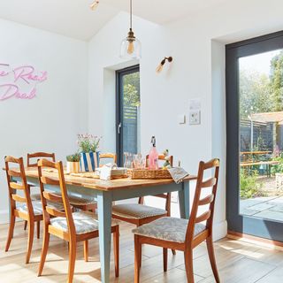 kitchen diner with table and picture window