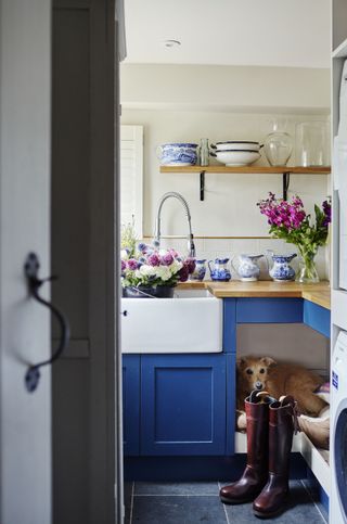 Utility room with a dog bed nook