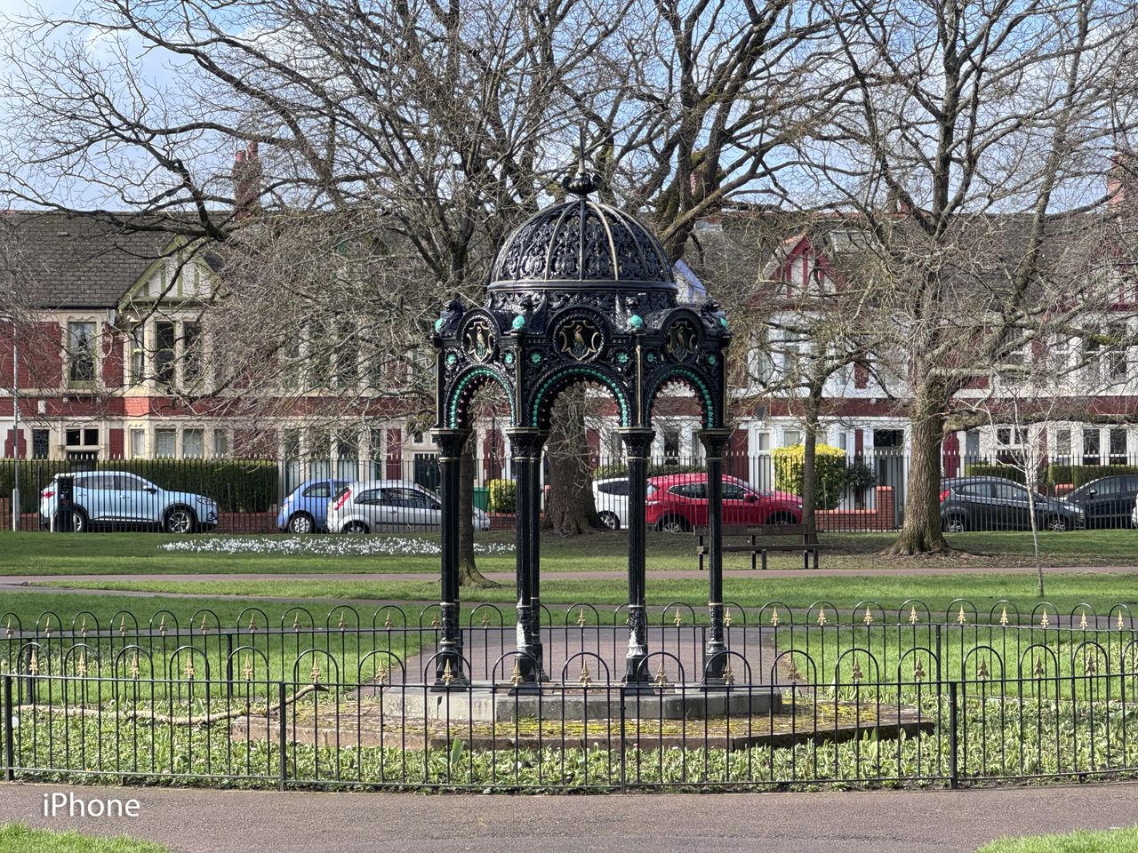 A photo of a park on a sunny day, taken on an iPhone 15 Pro