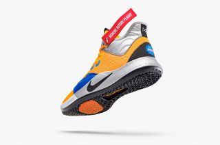 The Nike PG 3 X NASA sneaker features NASA's logo, a moon crater-inspired traction and a "Remove Before Flight" tag.