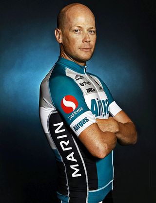 Chris Horner proudly displays the 2015 Airgas Safeway cycling team kit
