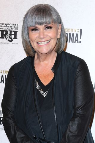 Dawn French is pictured with a grey bob whilst attending the "Oklahoma!" West End opening night at the Wyndham's Theatre on February 28, 2023 in London, England.