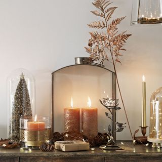 Hallway table with Christmas decorations and candles